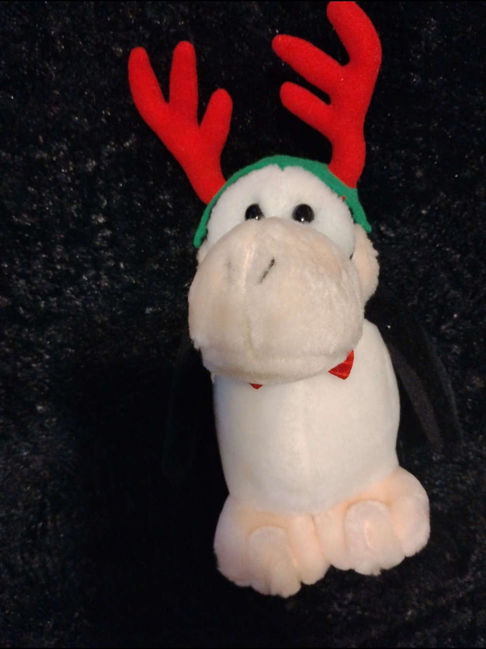 Plush Penguin with Red Antlers and Green Headband